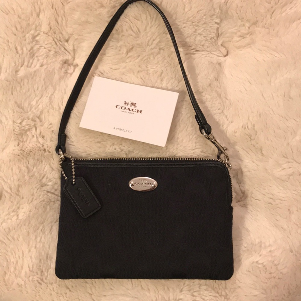 Black Classic Coach Wristlet. NWOT